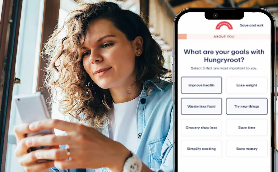 A woman taking the Hungryroot quiz on a phone