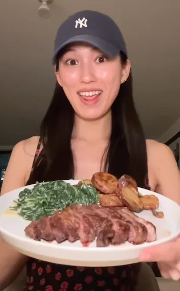 A happy Hungryroot customer with her plate