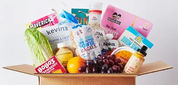 A Hungryroot box filled with fresh groceries and snacks