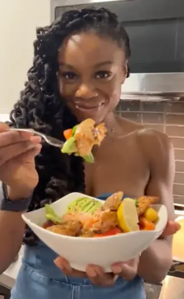 A happy Hungryroot customer enjoying a bowl