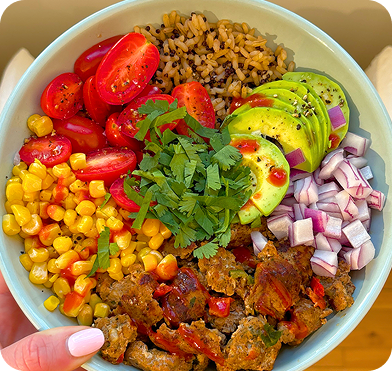 Colorful grain bowl with fresh ingredients